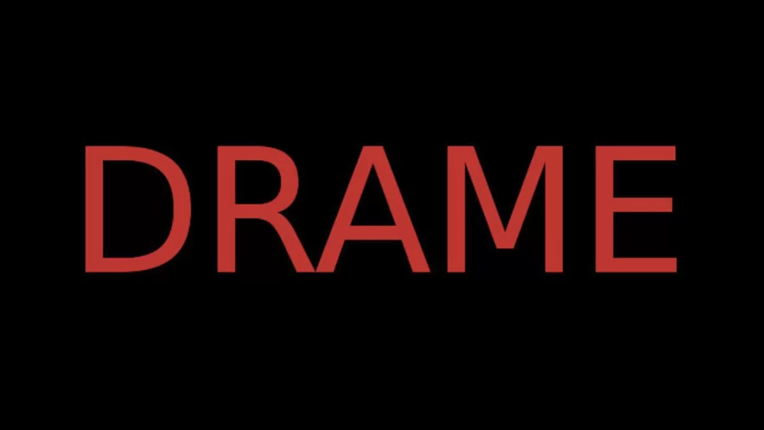 texte rouge DRAME sur fond noir
